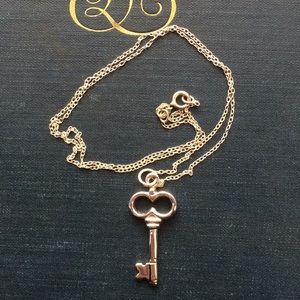Delicate sterling silver key necklace